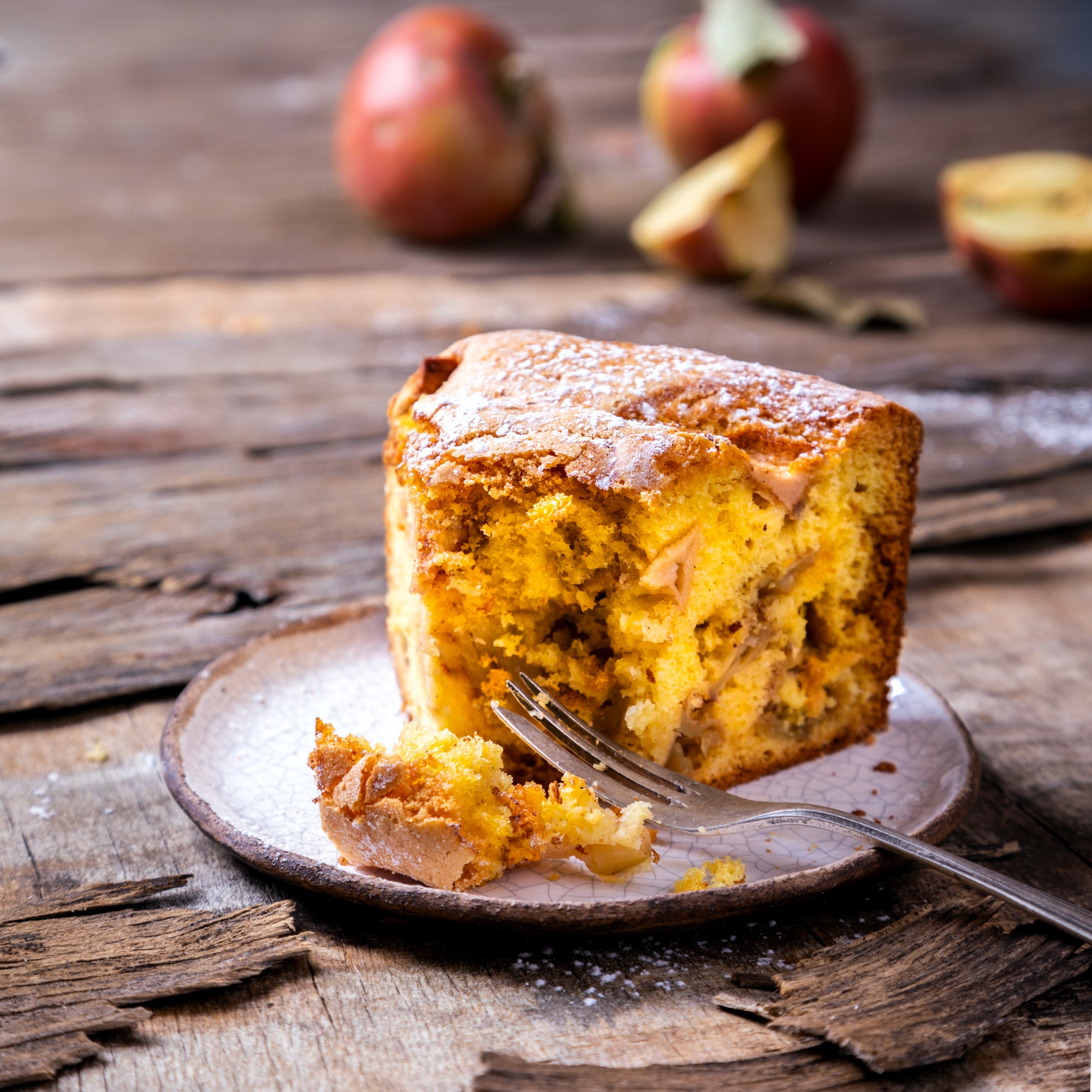 Apple pie on a wooden background. Fragrant autumn baking.