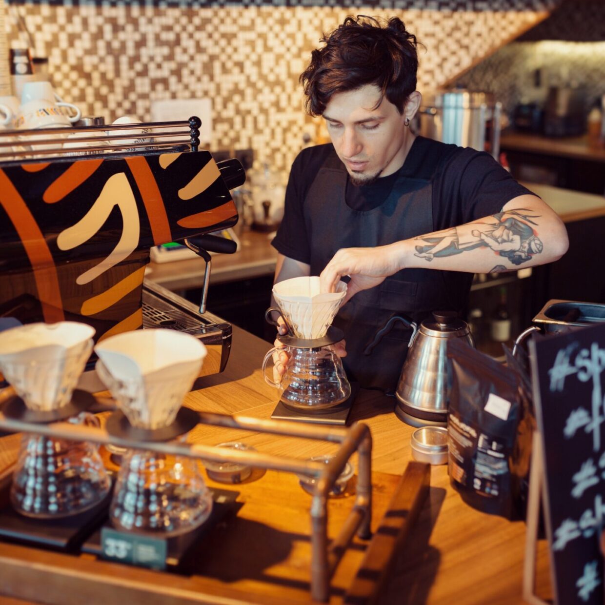 Barista at work in a coffee shop