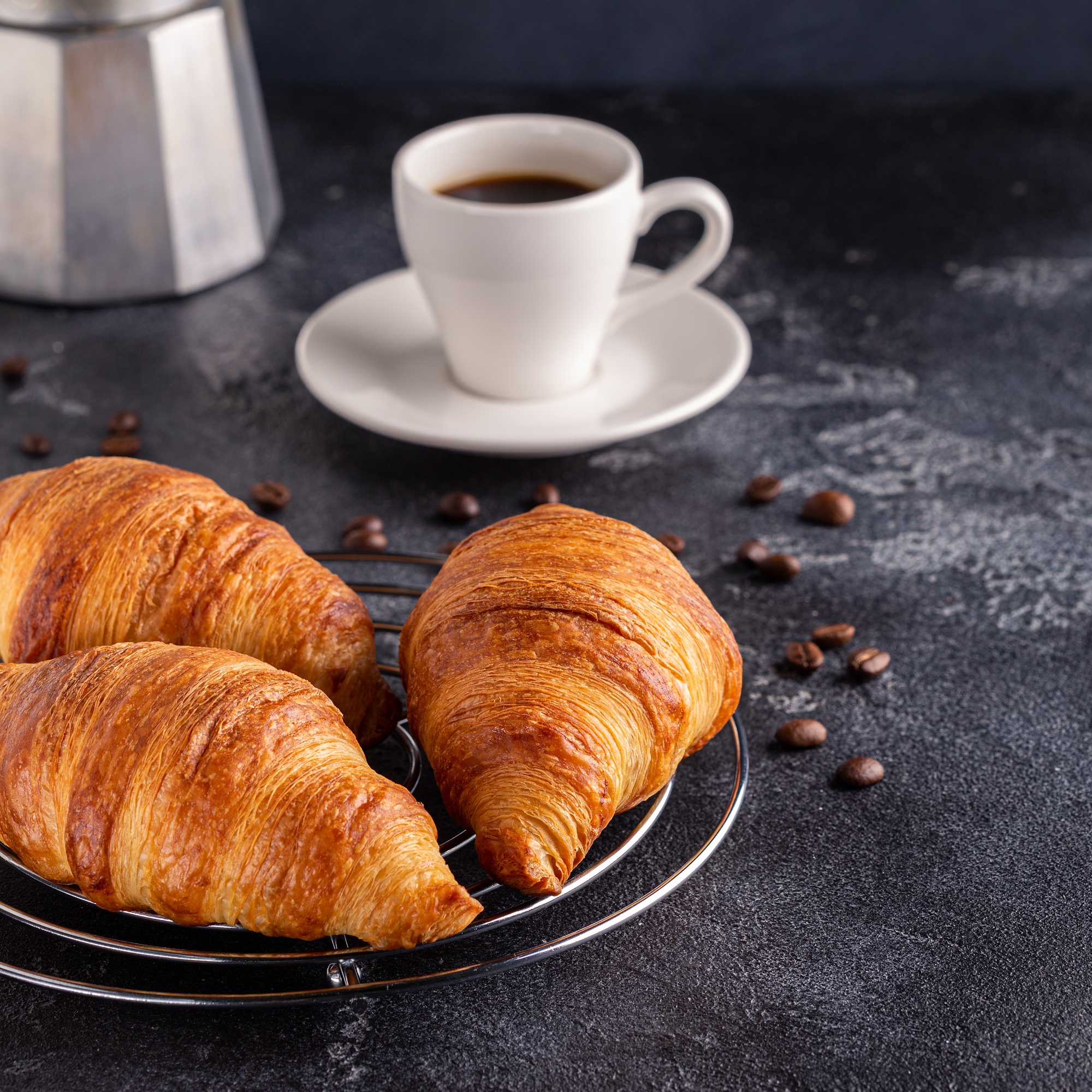 Breakfast with coffee and croissants