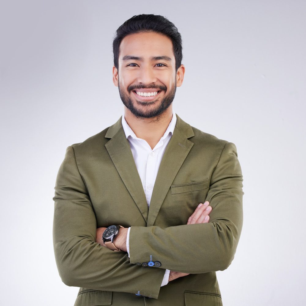 Smile, crossed arms and portrait of business man in studio for success, confidence mindset and lead