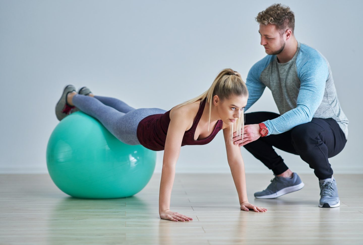 Woman with her personal fitness trainer