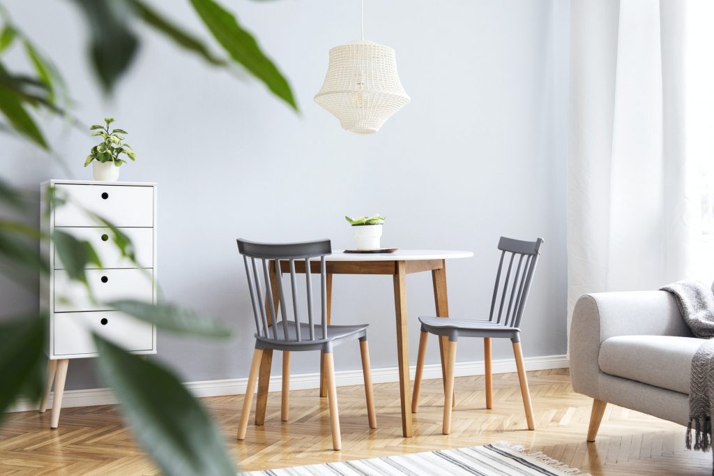 Modern scandinavian open space with design furniture.