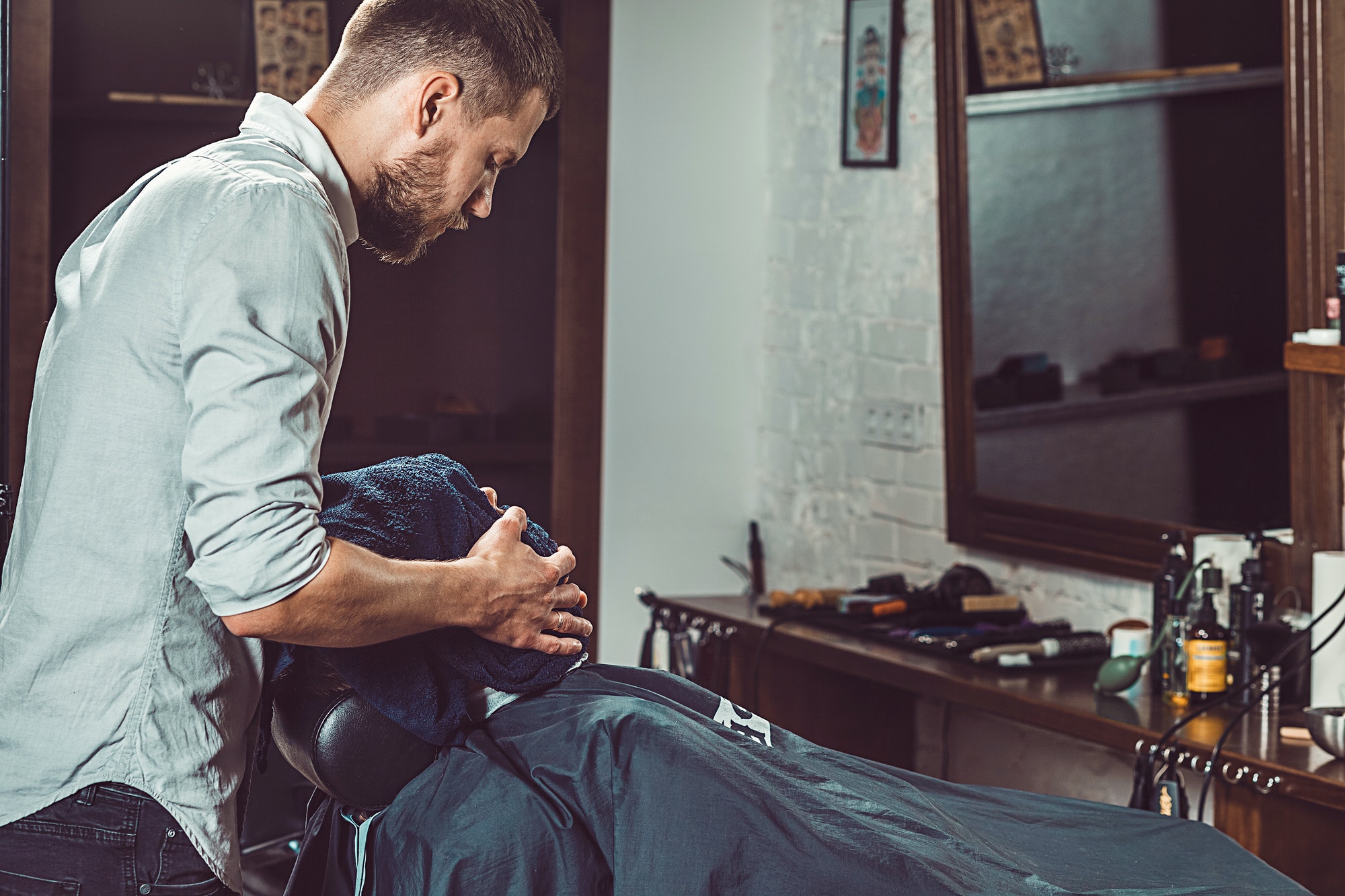 Hipster client visiting barber shop