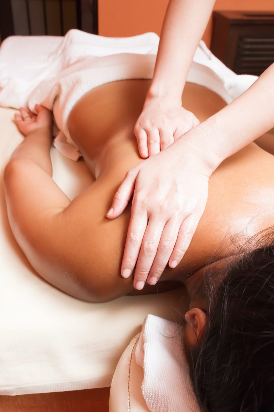 woman getting a massage at a health and beauty spa
