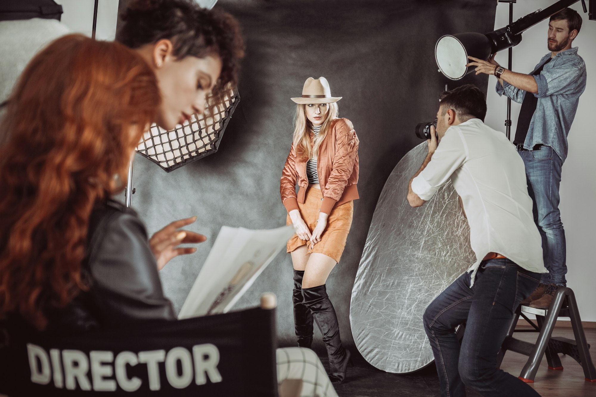 Model posing for photographer