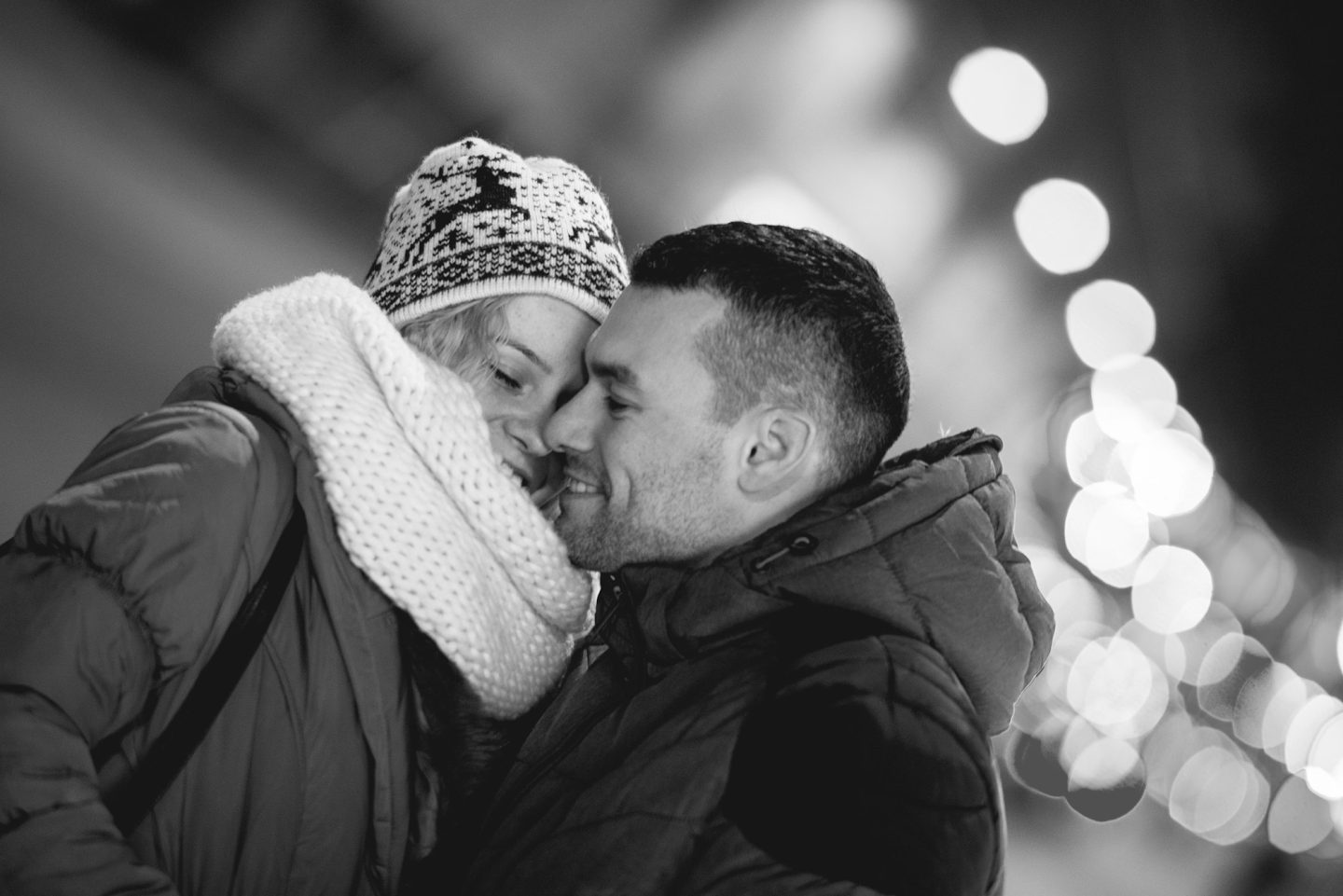 Romantic couple walking in city night,black and white photography