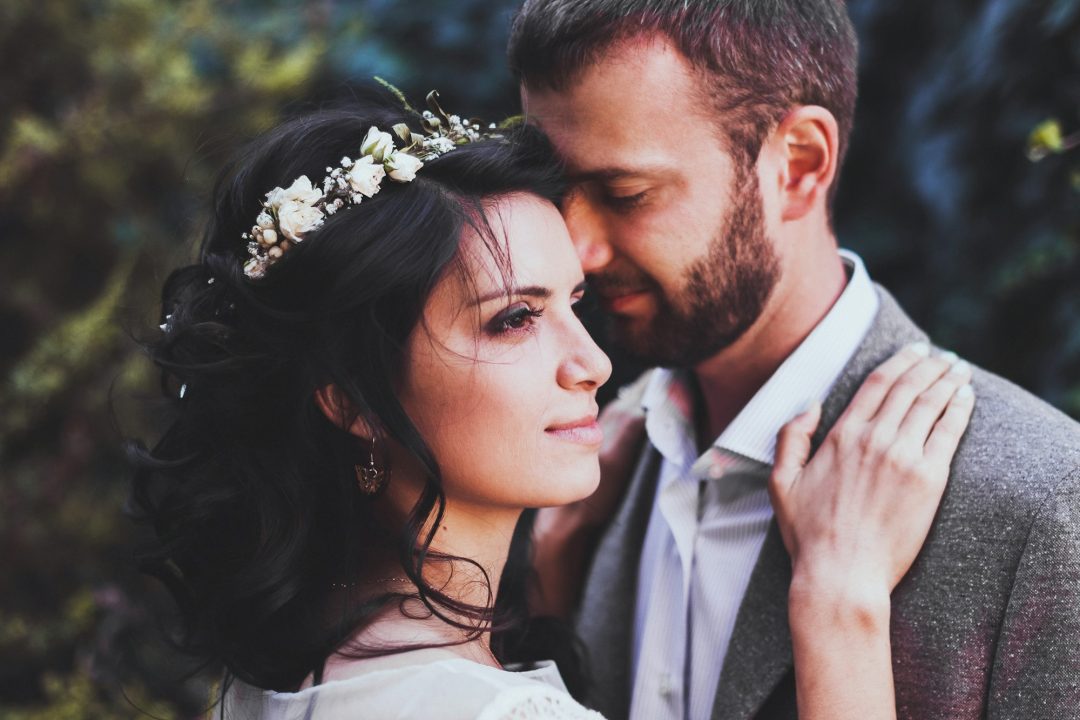 Sensual portrait of couple close-up. Wedding photography in rustic style