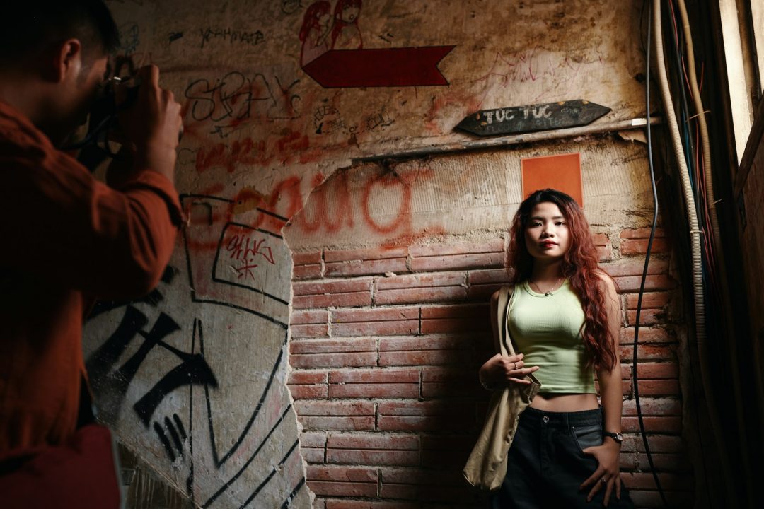 Young Woman Posing for Photographer