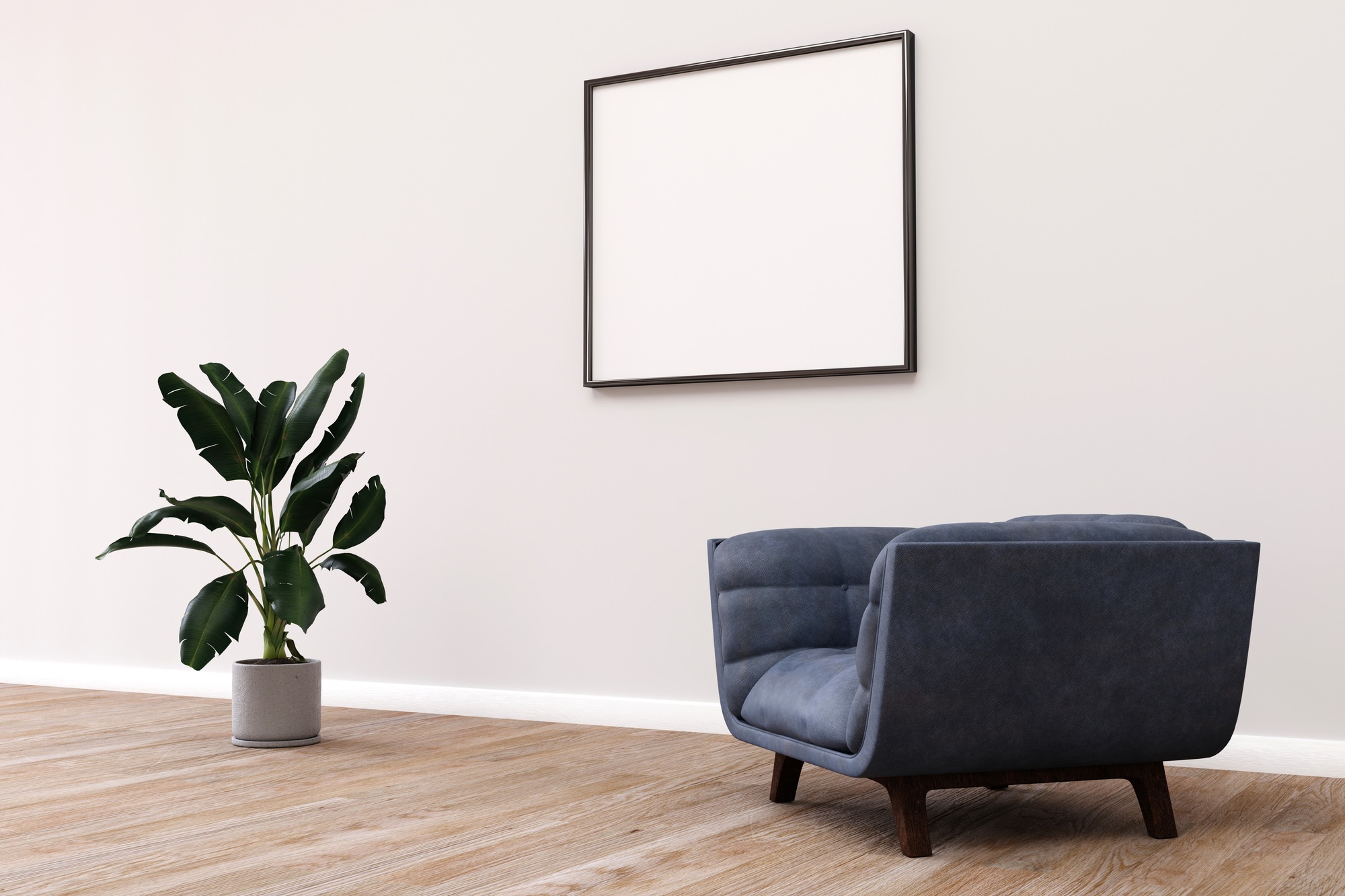 Modern room design with a comfortable armchair and a frame on the wall