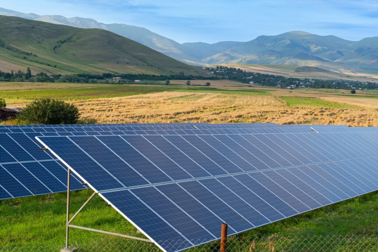 Solar plant that is located inside a valley surrounded by mountains
